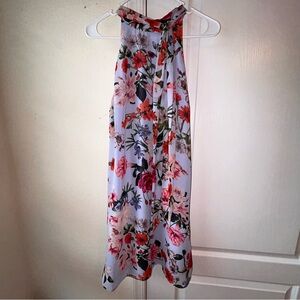 Size 8 Vince Camuto dress . Blue with floral patterns, worn once .